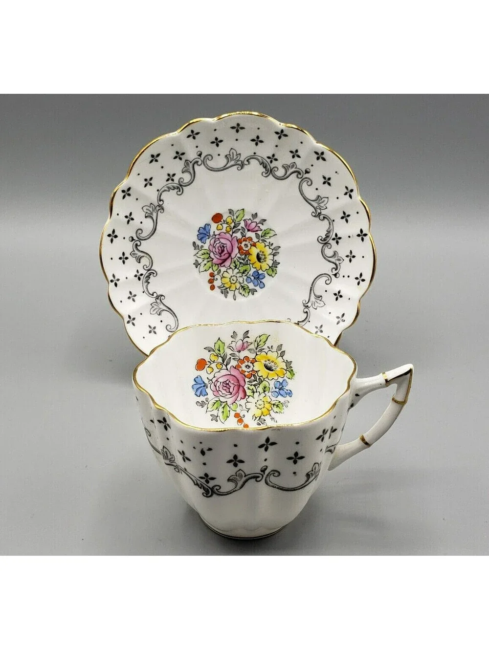 VTG Victoria C&E Teacup & Saucer Black Pattern Flower Medallion England Dainty